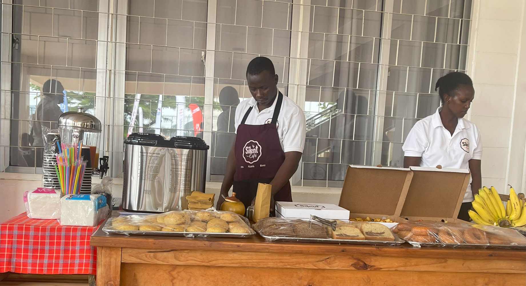 Professional catering setup by Silent Café team at a corporate event with inclusive service